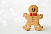 Gingerbread man with red bow tie