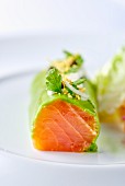 A Norwegian salmon roll with herbs and onions