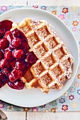 A waffle with cherries