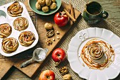 Apple rose tarts with caramel sauce and walnuts