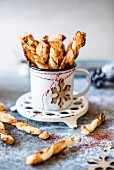 Puff pastry straws with smoked paprika and maple syrup for Christmas