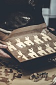 Unbaked reindeer cookies on a baking sheet