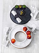 A round serving dish and a ring-shaped dish made of marble