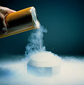 Liquid nitrogen being poured from a flask