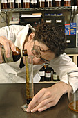 Herbalist preparing extract