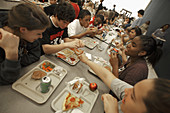 Middle School Students Eating in Cafeteri