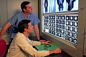 Doctor examining MRI scans