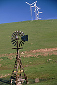 Old Windmill and Modern Wind Farm