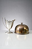 Polished Cup and Tarnished Cake Dome