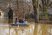 Residents Surveying Damage of Flood