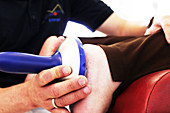 Orthopedist Examines a Patient's Foot