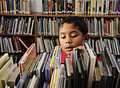 8 Year Old Boy in Library