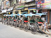 Rickshaw in centre of city,India