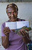 Woman with Ration Book for Food,Cuba