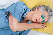 Older woman with headache