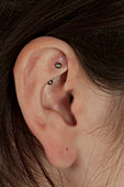 Ear with piercing