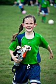 Young female football player