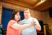 Disabled people dancing at exercise class