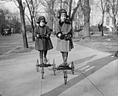 Children on scooters,1910s