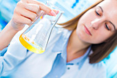 Scientist testing egg yolk in a lab
