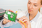 Technician repairing circuit board