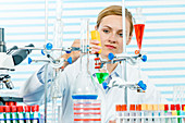 Female chemist working in lab