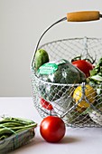 Fresh vegetables in a metal basket