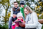 Family using digital tablet