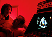 Man undergoing an echocardiography examination