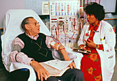 Man undergoing haemodialysis on kidney machine