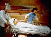 Time exposure image of a patient being moved