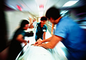Patient being rushed for emergency treatment