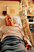 Male cardiac patient in intensive care unit