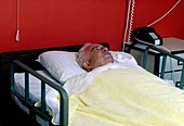 Patient resting in hospital bed