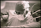 View of surgeons performing an operation