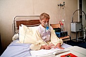 Boy receiving cystic fibrosis treatment
