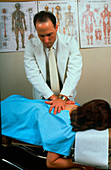 Chiropractor and patient