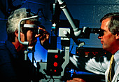 Woman undergoing laser eye surgery