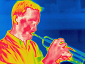A thermogram of a musician playing trumpet