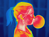 Girl Blowing a Bubble