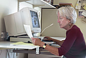 Woman working with a computer
