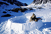 Eskimos making an igloo,Ellesmere Island