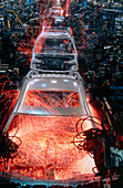 Robots welding in a car body production line