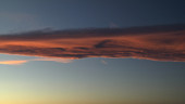Mountain wave clouds at sunset