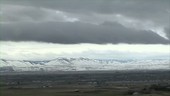 Clouds over mountains, timelapse