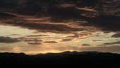 Sunset over mountains, timelapse
