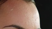 Sweat on forehead