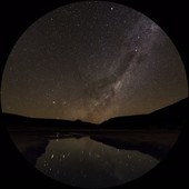Milky Way reflected in lake, timelapse