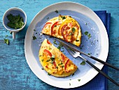 A tomato and red pepper omelette