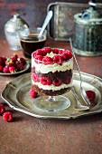 Chocolate vanilla raspberry trifle made with brownie, Mascarpone and whipped cream and raspberry layers